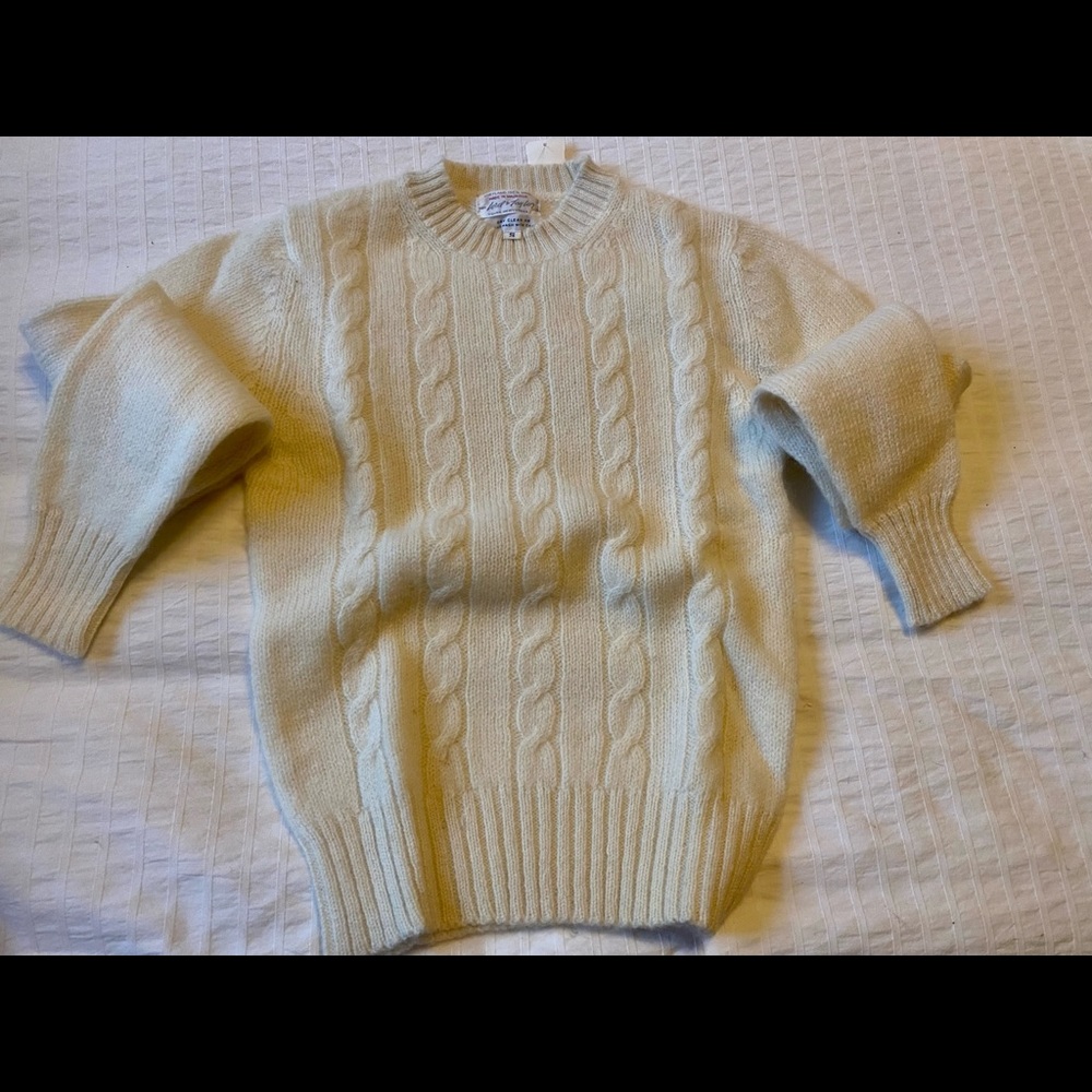 Woman’s 100%Shetland wool sweater in original box. Never worn